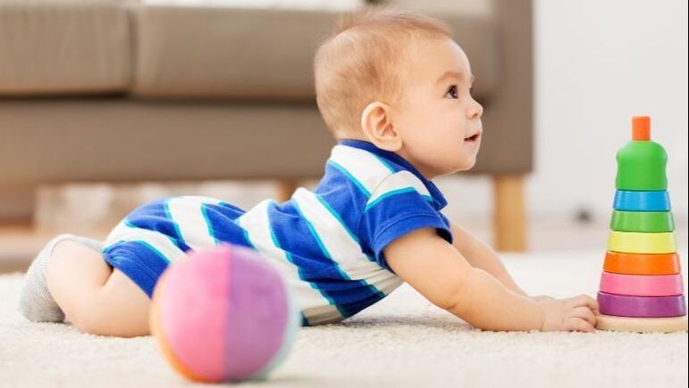 Baby on clean carpet